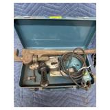 Makita hammer drill and large pipe wrench