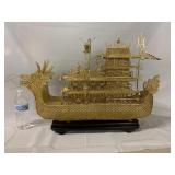 Gold Dragon Boat on wooden stand