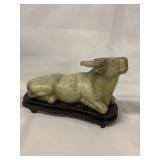 Chinese Jade figure of reclining ox on wooden base