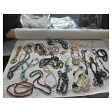 22 assorted costume jewelry necklaces