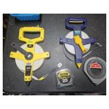 4 tape measures 25, 50, & 100 feet