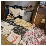 3 totes of linens, placemats,  doiies