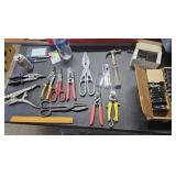 Assorted snips,  circuit breakers, chain saw