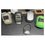 4 welding masks & 1 magnifying goggles
