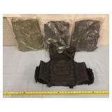 4 tactical vests (3 black, 1 green)