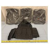 4 black tactical vests