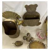 Brass teddy bear and wall decor