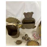 Brass teddy bear and wall decor