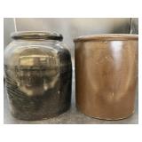 Crocks 1 black, 1 brown