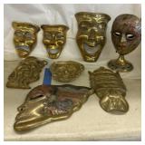 Brass masks and faces
