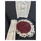 Assorted place mat doilies table runner and a