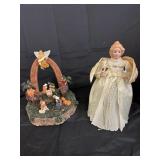 Tree top angel and musical nativity scene
