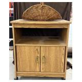 Rolling oak looking ( not oak) cabinet  and