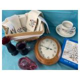 Basket, fabric napkins, clock, tea cup, vases