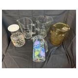 Pitchers glass and one plastic