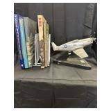 MILITARY HISTORY BOOKS AND A MODEL P-51 mustang