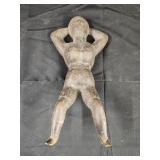 Antique Naughty Nellie cast iron door stop