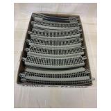 42 Curved Pieces of Model Train Track