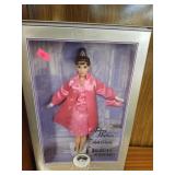 Audrey Hepburn as Holly Golightly