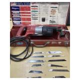 MILWAUKEE CORDED SAWZALL AND AN ASSORTMENT OF