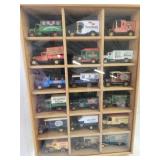Wall display cabinet full of die cast model cars