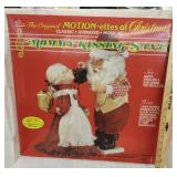 Mommy kissing Santa  musical display