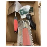 Drywall, pale, scoop tile trowel and a corner