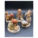 4 Hummel porcelain Figurines