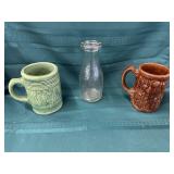 2 mugs and a milk jar