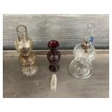 Kerosene lamps, vase, small glass bottle.