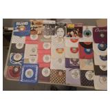35 assorted 45rpm vinyl records, many promo copies