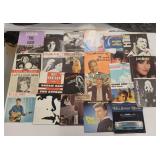 25 45rpm vinyl records with sleeves: Elton, B