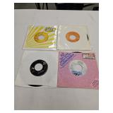 4 Elvis Preskey 45 records without photo sleeves