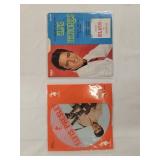 2 Elvis Presley 45 records with sleeves