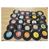 25 assorted 45 rpm vinyl records, including Hank