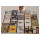 21 CDs: Beatles,  Elvis, & Elton John