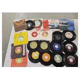 22 45rpm records & empty sleeves