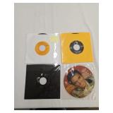 4 Elvis Preskey 45 records without photo sleeves