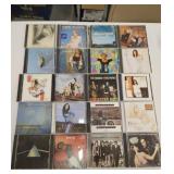 20 assorted CDs: Eagles, Cher, country, Pink