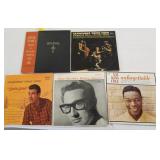 5 albums: Buddy Holly Story,  Nat King Cole,