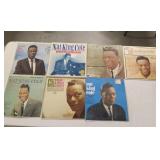 7 Nat King Cole record albums,  one is 4-record