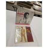 2 Elvis Presley 45 records with sleeves
