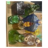 Assortment of different color decanters