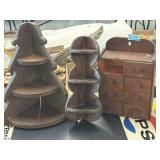 Two wooden corner sales and a wooden wall eight