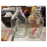 1 Vintage, 1 New Glass Milk Jugs