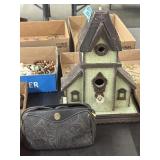 A bird house and a liz Claiborne purse