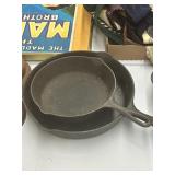 (2) cast-iron skillets