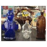 Amber colored fish jar and a blue presidential