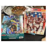 Two 200 piece puzzles one is USA basketball and
