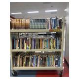 Assorted books (shelf not included)